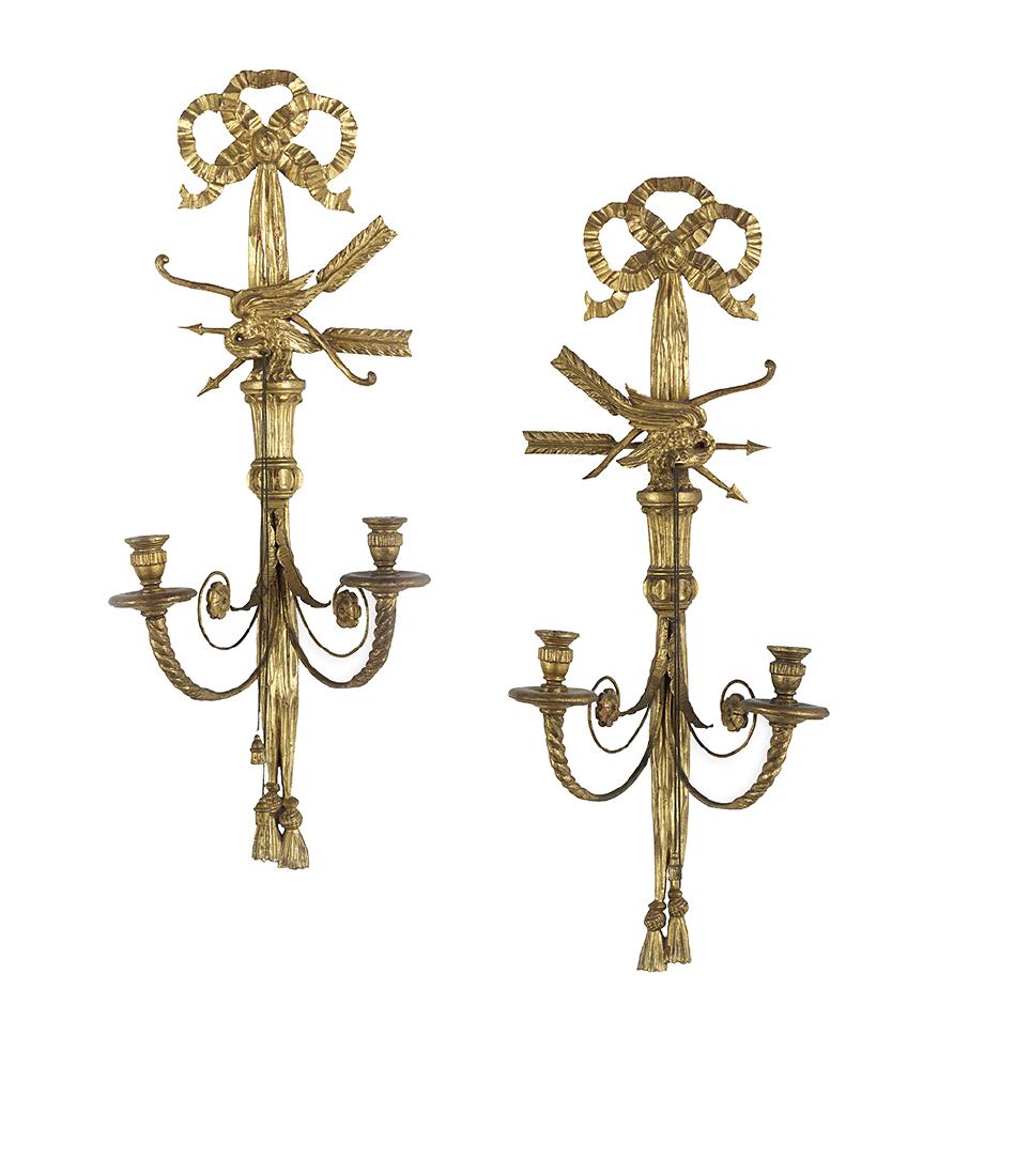 Pair of Georgian-Style Giltwood Sconces: Pair of Georgian-Style Giltwood Sconces 20th century, Italian, on fringed bowknot backplates decorated with carved eagles holding tassels, with crossed bows and arrows, the twisted candle arms with wi