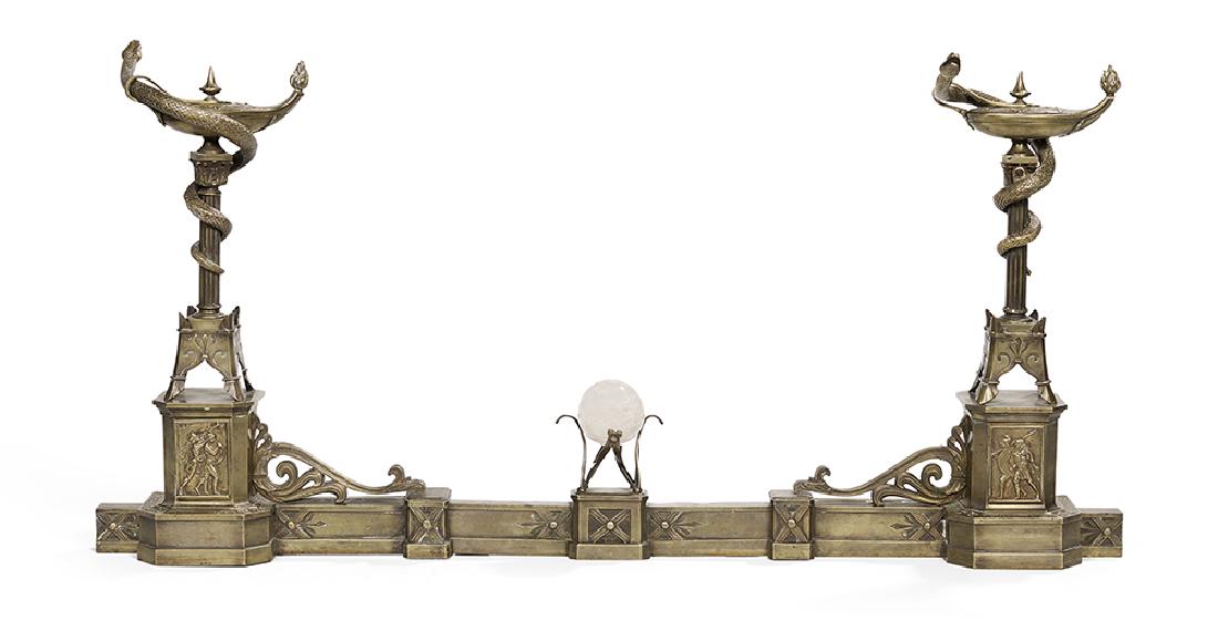 Neo-Grec Bronze Chenets with Integral Fender: Handsome Neo-Grec Bronze Chenets with Integral Fender third quarter 19th century, French, the chenets molded with columns mounted with classical oil lamps wound molded serpents, with an integral fende