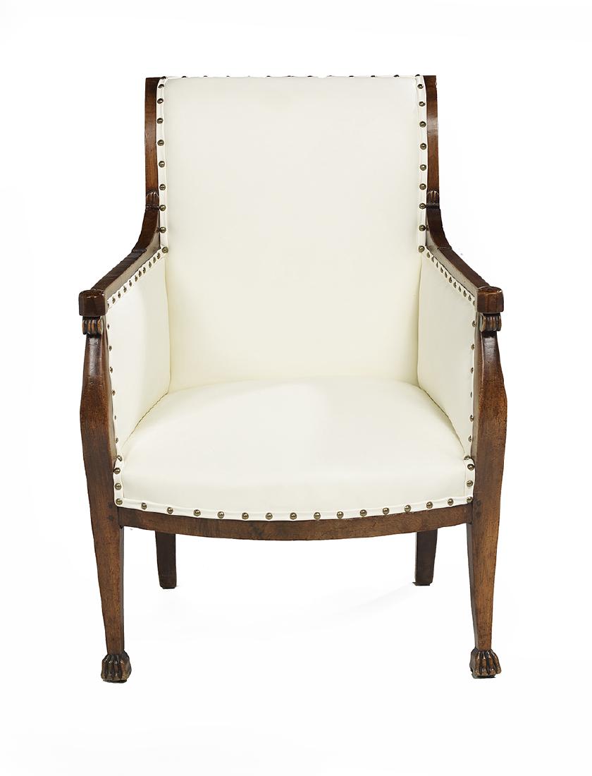 Restauration-Style Mahogany Bergere: Restauration-Style Mahogany Bergere late 19th century, the stiles with scroll tops, the arms ending in carved rosettes on shaped supports extending to carved paw feet. h. 36"