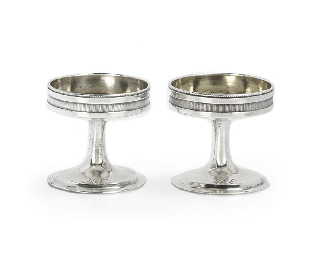 Pair of German Biedermeier Silver Pedestal Salt Cellars: Pair of German Biedermeier Silver Pedestal Salt Cellars second quarter 19th century, 13 lot (.813) silver, each with a shallow circular bowl decorated with finely reeded band and beaded rim, raised on