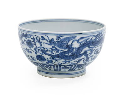 Chinese Blue and White Porcelain Dragon Bowl: Chinese Blue and White Porcelain Dragon Bowl possibly Ming Dynasty, Wanli period (1573-1620), of steep-sided form on a raised foot, decorated to the exterior with five-claw dragons amid a scrolling pe