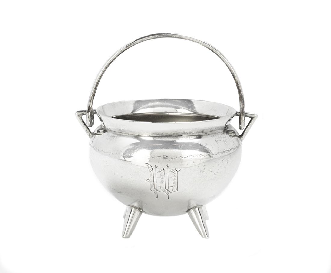 Gorham Sterling Silver Novelty Salt Cellar: Gorham Sterling Silver Novelty Salt Cellar Model #1136, introduced in 1871, this example with date mark of 1872, in the form of a realistic camp cauldron with swing handle and four peg feet, decorated