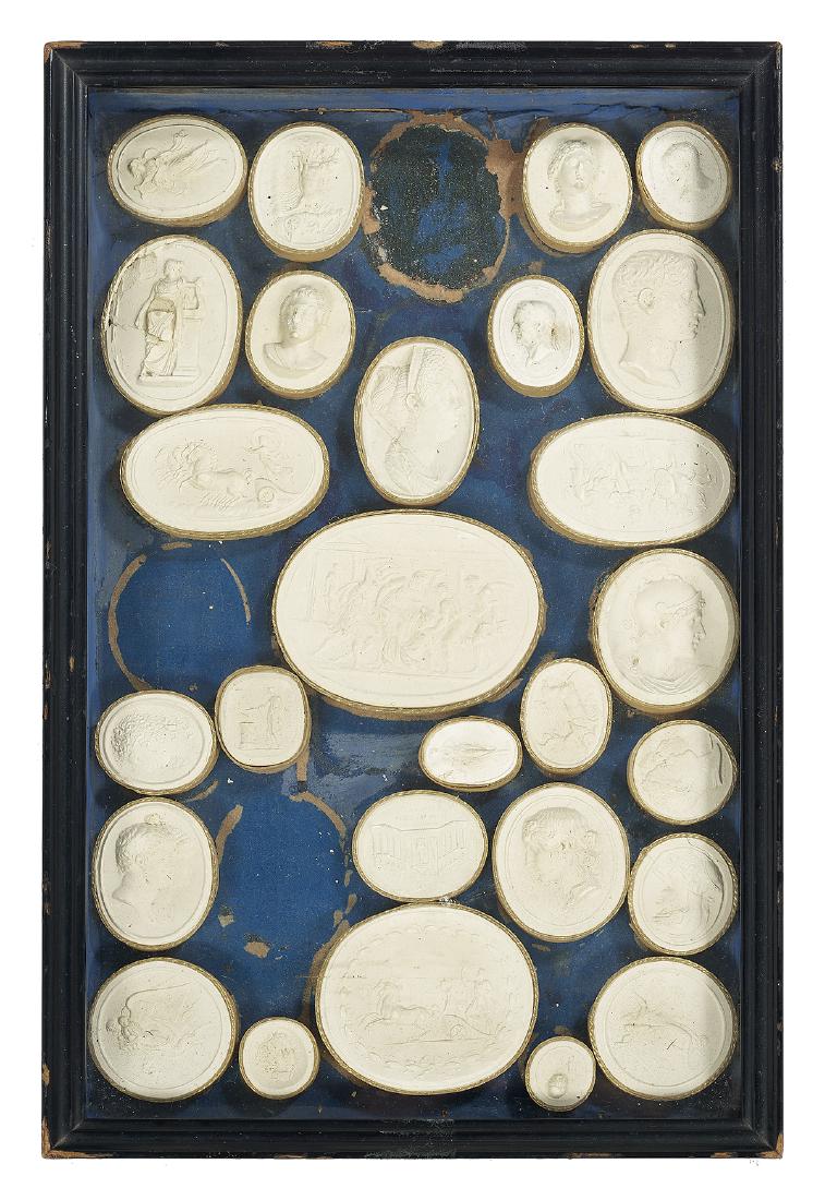 Set of Grand Tour Souvenir Plaster Intaglios: Cased Set of Grand Tour Souvenir Plaster Intaglios second quarter 19th century, probably Italian, molded with various profiles and views after the Antiques, lined with gilt paper within an ebonized ca