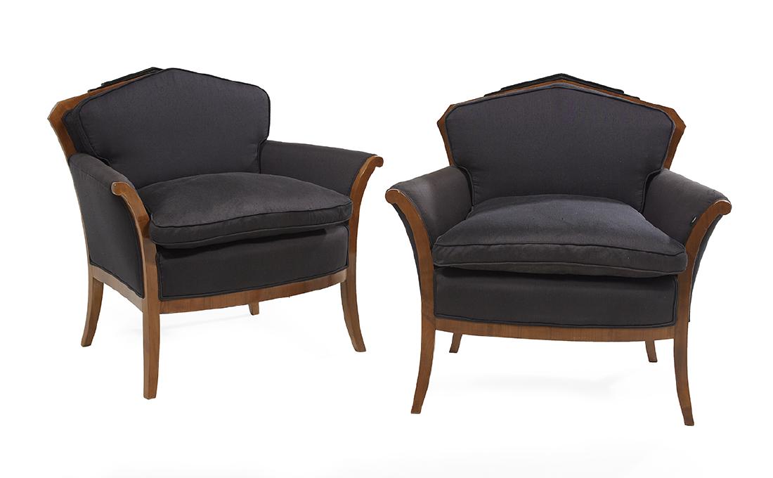 Pair of Art Deco Fruitwood Bergeres: Pair of Art Deco Fruitwood Bergeres 20th century, in the Biedermeier taste, each with a cushioned triangular back surmounted by an ebonized crest, joined by padded outswept arms to the cushioned seat,