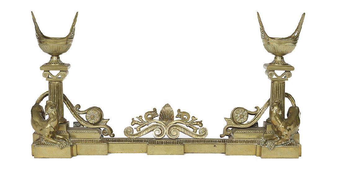 French Neo-Grec Chenets with Integral Fender: Handsome French Neo-Grec Chenets with Integral Fender third quarter 19th century, the chenets decorated with Ionic columns supporting kylixes and figures of Romulus and Remus, the fender with a pierce