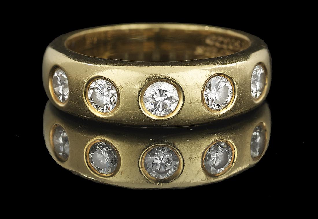 Van Cleef & Arpels Diamond Band: Van Cleef & Arpels Diamond Band 18k yellow gold, the band mounted with round brilliant-cut diamonds weighing approximately 0.63 carats in total, approximate color E-F and clarity VS1-VS2, stamped "Van