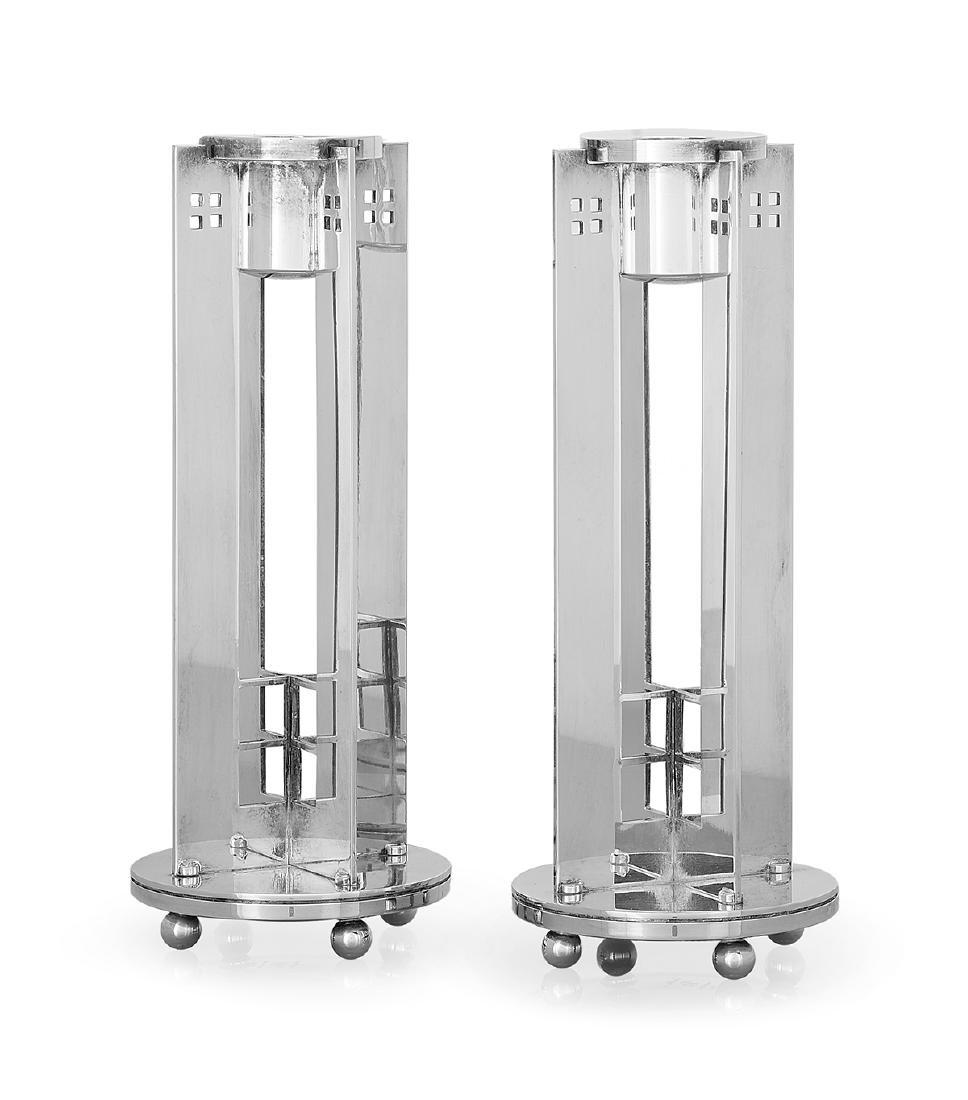 Pair of Swid Powell Silverplate Candlesticks: Pair of Swid Powell Post-Modernist Silverplate Candlesticks fourth quarter 20th century, New York, designed by Richard Meier (b. 1934), geometric design with circular bases and openwork squares. h. 9-