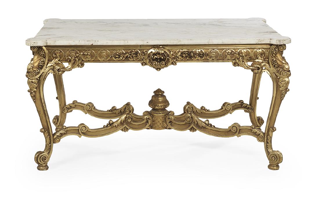 Louis XV/XVI-Style Marble-Top Center Table: Louis XV/XVI-Style Giltwood and Marble-Top Center Table the white marble top with projecting ormolu corners, above a conforming apron with foliate carving, raised on cabriole legs joined by serpentine