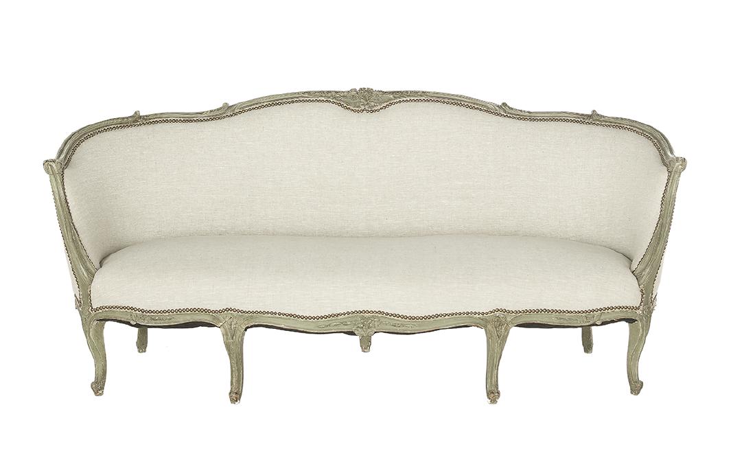 Louis XV-Style Polychrome Canape: Louis XV-Style Polychrome Canape first quarter 20th century, the serpentine-shaped crest centered by a floral carving, over a conforming padded back and arms, above the like seat, raised on cabriole l