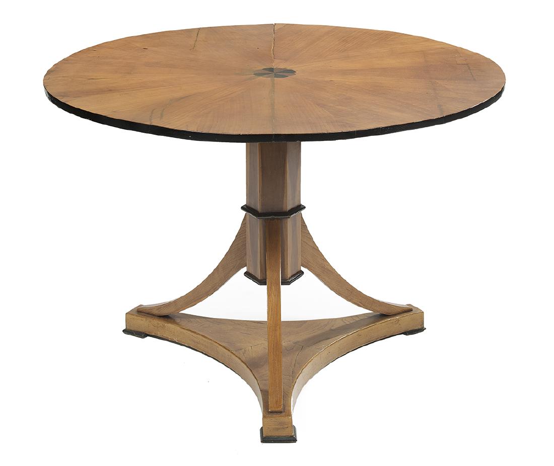 Biedermeier Fruitwood Center Table: Biedermeier Fruitwood Center Table 19th century, the circular top with a central inlaid ebony and hardwood rosette, on a hexagonal column joined to three shaped legs, on a concave base. h. 28", dia. 4