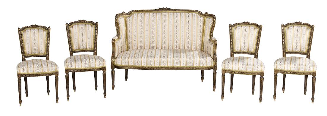 Louis XVI-Style Five-Piece Giltwood Parlor Suite: Louis XVI-Style Five-Piece Giltwood Parlor Suite late 19th century, comprised of a settee, h. 40", w. 53", d. 23", and four side chairs, h. 35", all with a padded, slightly domed back surmounted by a 