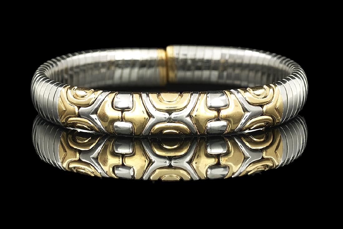 Bvlgari Parentesi Bracelet: Bvlgari Parentesi Bracelet 18k yellow gold/stainless steel, the flexible bracelet with a geometric pattern on the front, stamped "BVLGARI, 750". inside circumference 6-1/2", total weight 36.6 grams No