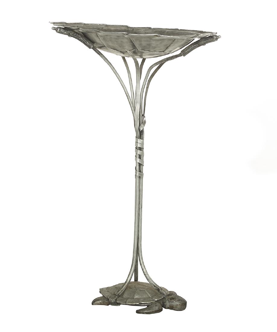 Art Deco Aluminum Bird Bath: Art Deco Aluminum Bird Bath second quarter 20th century, probably French, with a weighted tortoise base, and cattails supporting the inverted tortoiseshell-form bath. h. 35-1/4", w. 23-1/2", d. 16-1/2