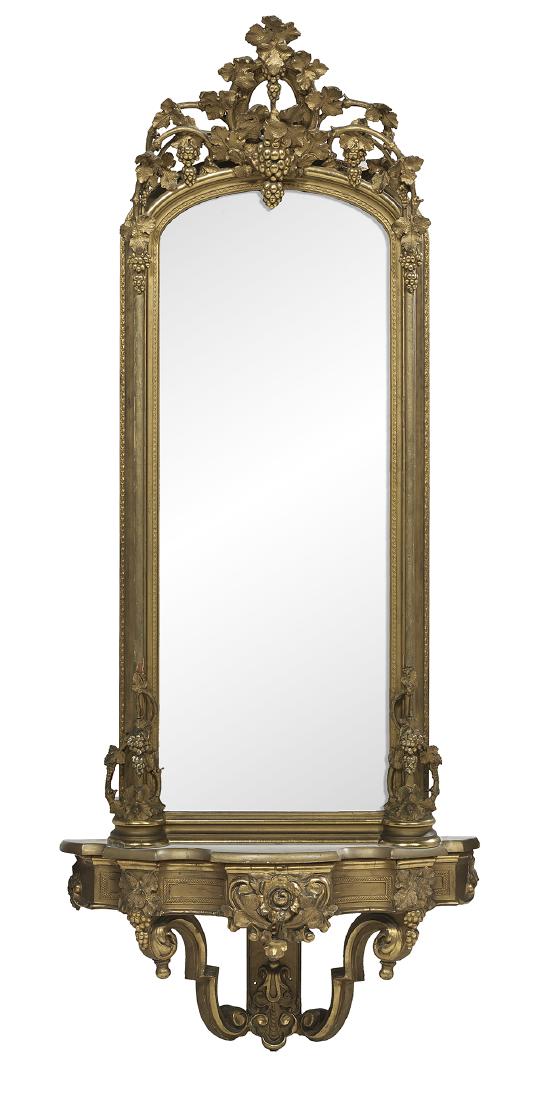 American Rococo Revival Pier Mirror and Bracket: American Rococo Revival Pier Mirror and Matching Marble-Top Bracket mid-19th century, the arched top mirror decorated with a pierced crest of grapes and grapevines, the serpentine bracket with fruit a