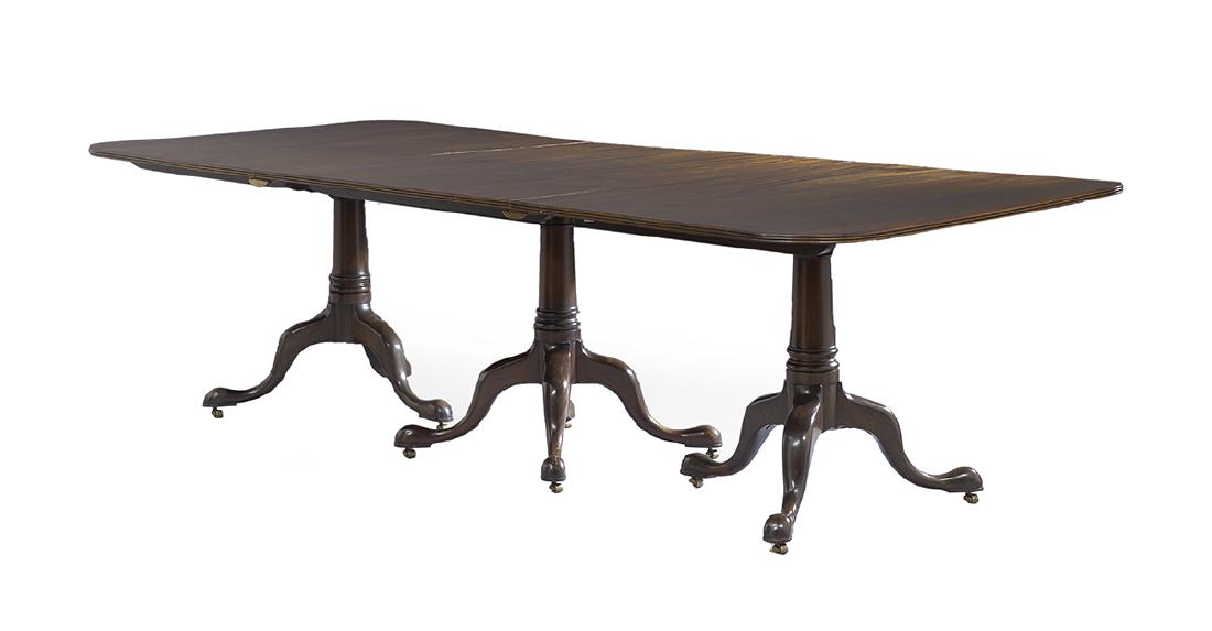 Georgian-Style Mahogany Dining Table: Georgian-Style Mahogany Dining Table the rounded rectangular top with a reeded edge and above three pedestals, each with a turned columnar support to three splayed cabriole legs ending in pad feet. h.