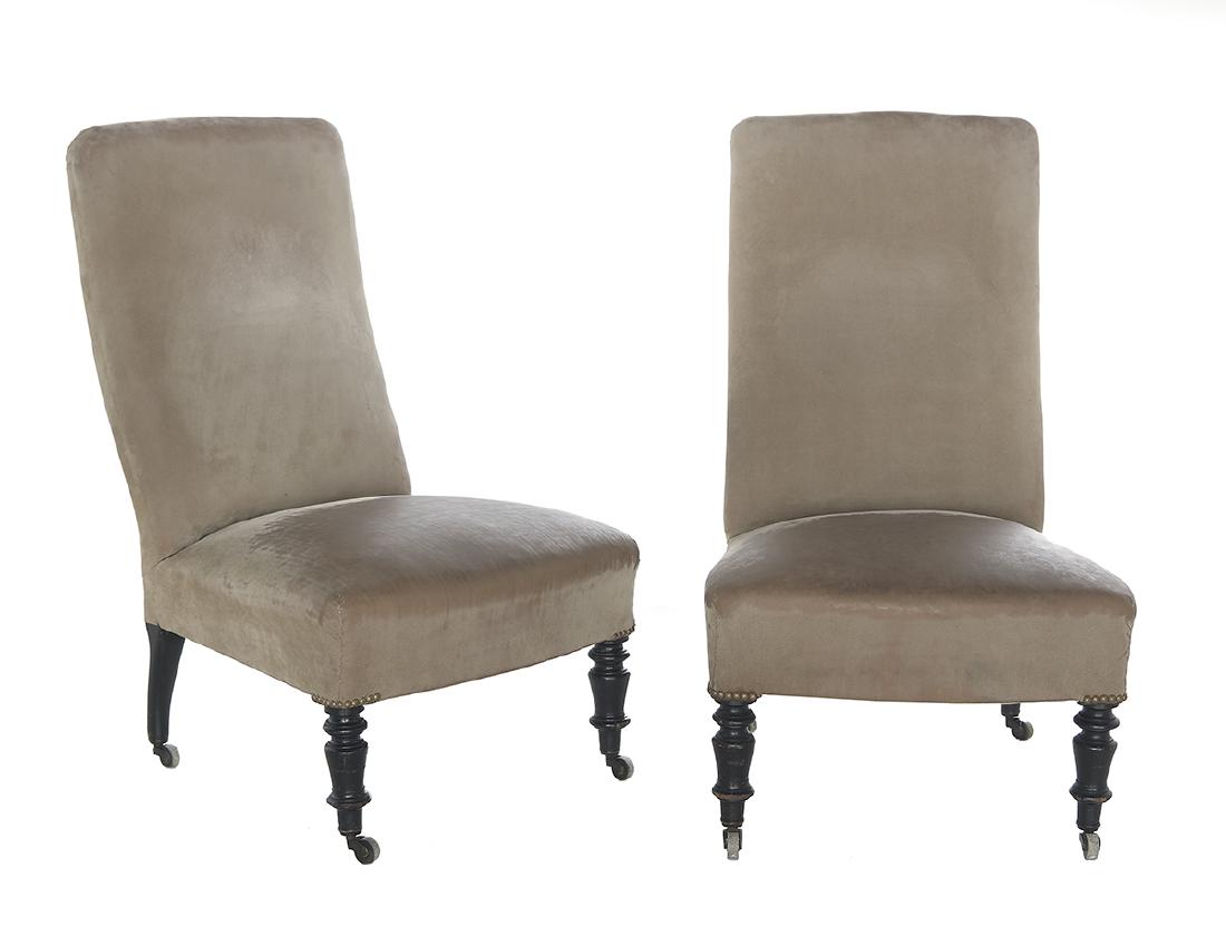 Pair of Louis-Philippe Slipper Chairs: Pair of Louis-Philippe Ebonized and Upholstered Slipper Chairs third quarter 19th century, each having a padded back and seat, and raised on turned legs. h. 35-1/2", w. 21", d. 21"