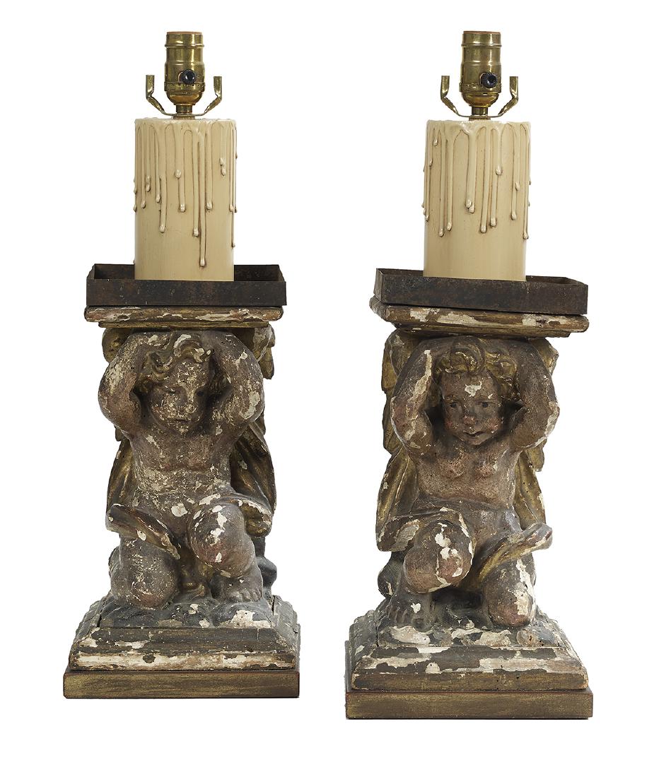 Pair of Baroque Giltwood Architectural Elements: Pair of Baroque Giltwood Architectural Elements ca. 1700, now mounted as lamps, carved with kneeling angels supporting plinths, with tole drip pans, electrified. overall h. 21-1/2", w. 7-3/4", d. 6-3/