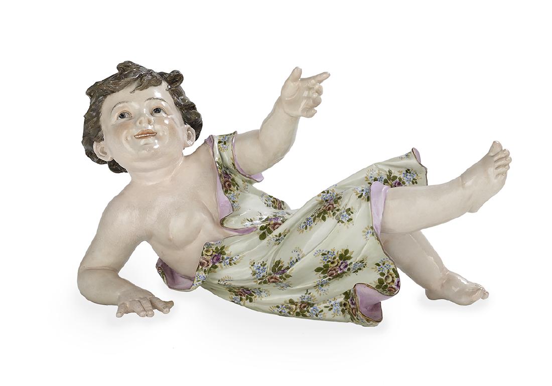 Large Meissen-Style Porcelain Figure: Large Meissen-Style Porcelain Figure ca. 1900, depicting a reclining child with flowered dress, the underside marked with blue crossed swords. h. 9-1/2", w. 16", d. 7"