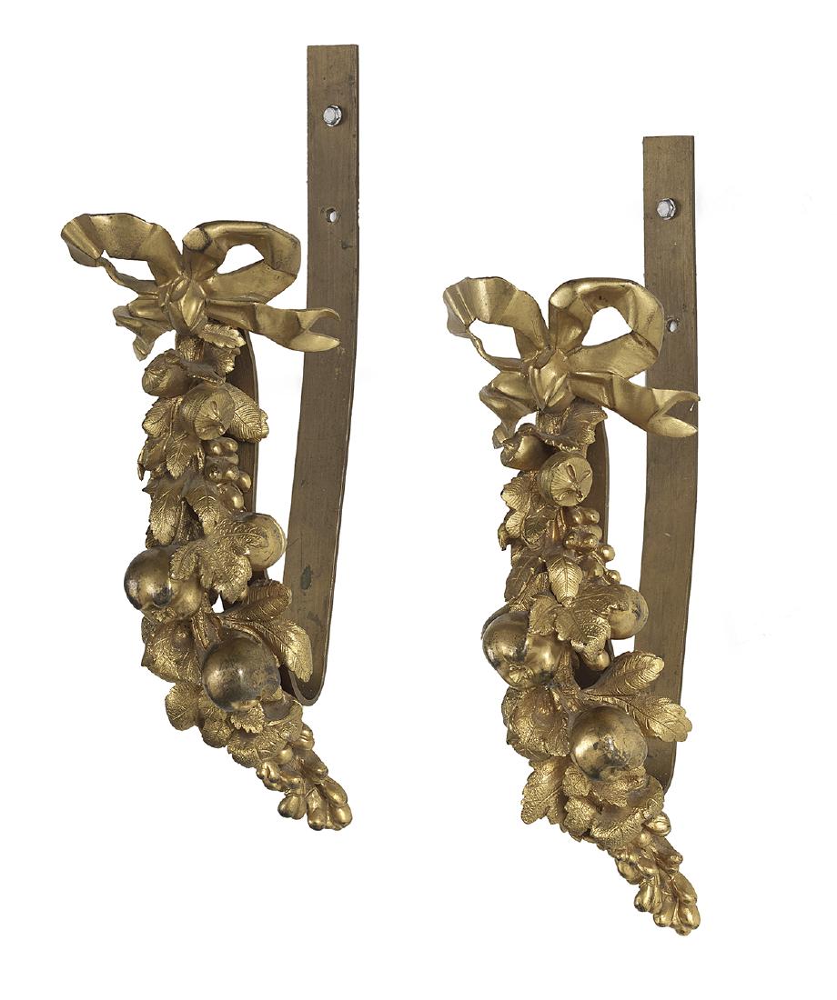 Pair of Rococo-Style Gilt-Bronze Tie-Backs: Pair of Rococo-Style Gilt-Bronze Tie-Backs first quarter 20th century, French, decorated with molded bunches of fruit held with pierced bowknots. w. 11-1/2", d. 5"