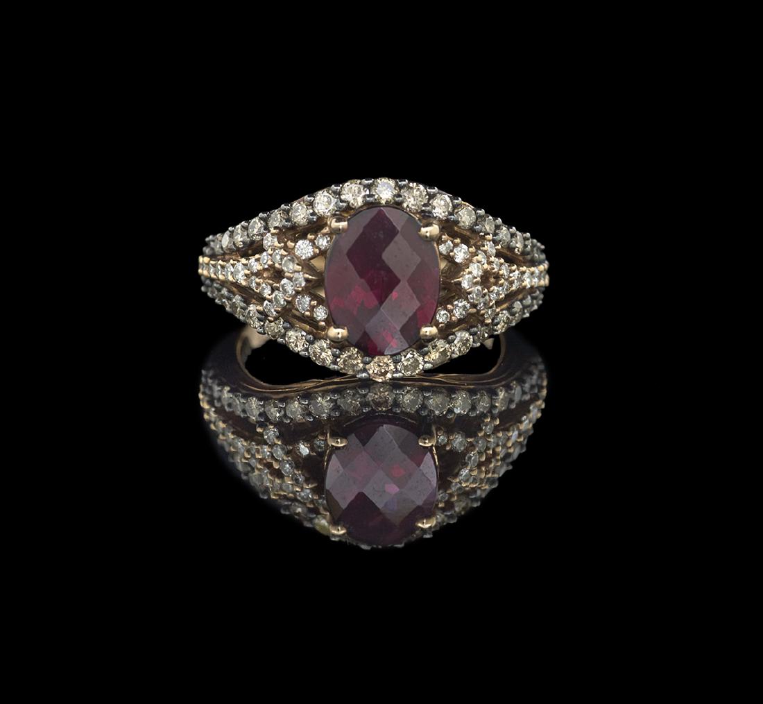 Le Vian Chocolate/White Diamond and Garnet Ring: Le Vian Chocolate/White Diamond and Garnet Ring 14k rose gold, set with an oval checkerboard-faceted garnet, with an approximate weight of 1.25 carats, thirty-eight round brilliant-cut chocolate diamo