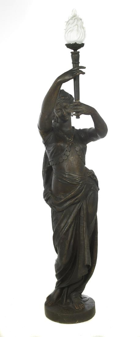 American Cast Iron Newel Post Light: American Renaissance Revival Cast Iron Newel Post Light third quarter 19th century, originally outfitted for gas, depicting a robed maiden holding a torch. h. 72", dia. 13"