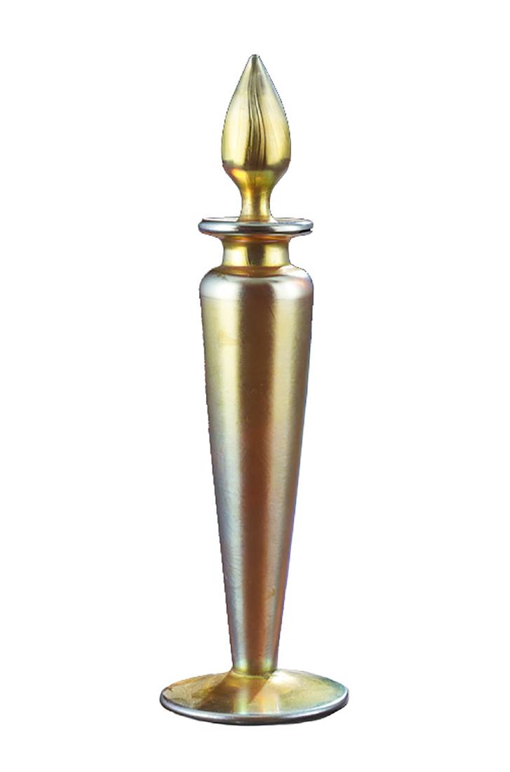 Steuben Gold Aurene Perfume Bottle: Steuben Gold Aurene Perfume Bottle with Teardrop Stopper early 20th century, the bottom of the foot etched "Aurene 1414". h. 7-3/4"