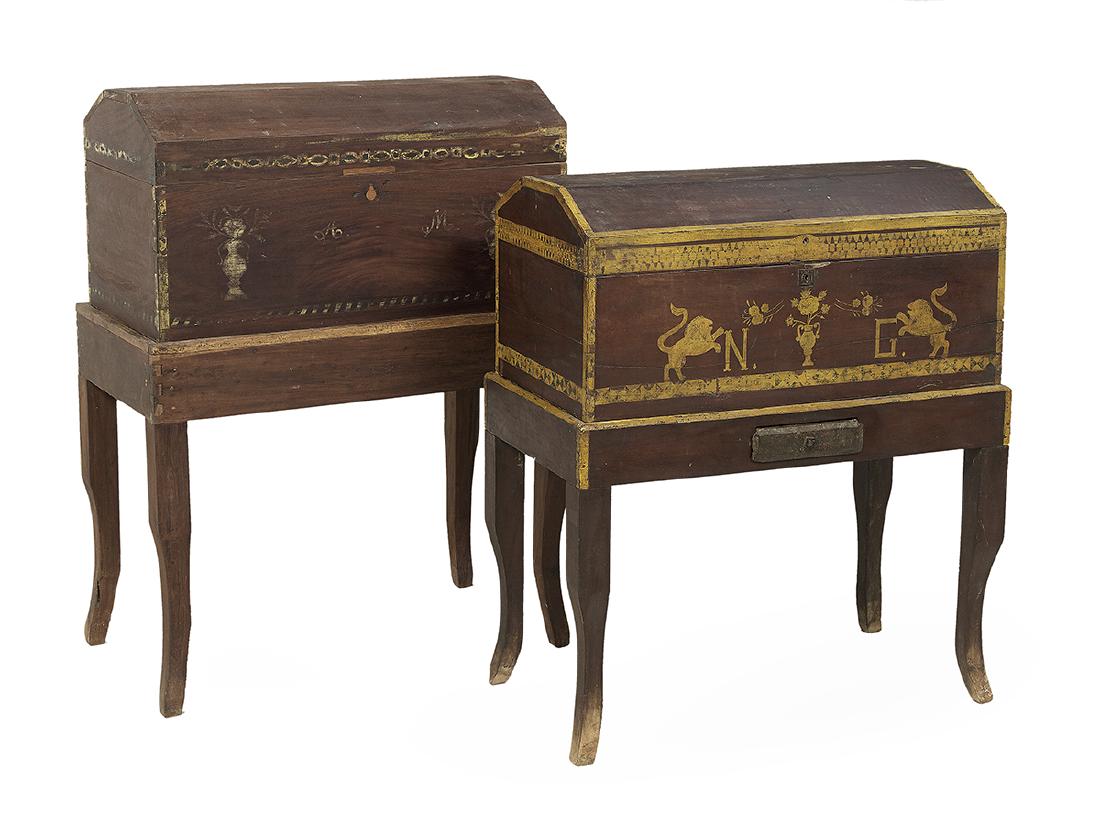 Two Continental Paint-Decorated Trunks on Stands: Two Continental Mahogany and Paint-Decorated Trunks on Stands 19th century, each with a faceted and domed top, dovetailed corners and mounted to a cabriole-leg stand, the front of each trunk with pain