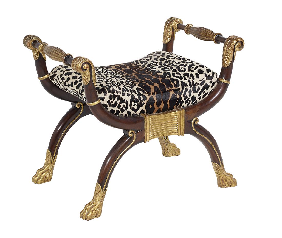 Regency-Style Mahogany and Parcel-Gilt Stool: Regency-Style Mahogany and Parcel-Gilt Stool 20th century, made by Maitland-Smith, of curule form and covered in faux leopard fur. h. 26", w. 31", d. 21"