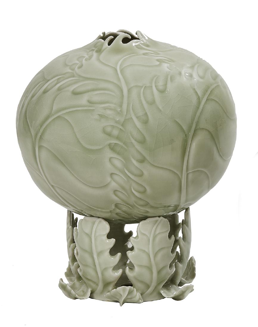 Cliff Lee, (Austrian/Taiwan, b. 1951): Cliff Lee (Austrian/Taiwan, b. 1951) "Cabbage Vase" kaolin clay of globular form, with delicately incised leaves in overlapping design, forming a narrow neck, with all-over celadon glaze, sitting on a