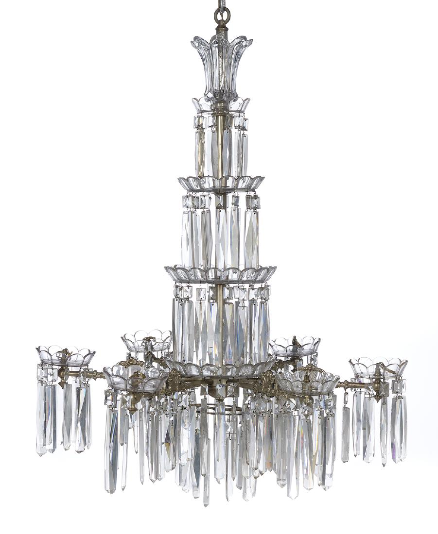 English Silvered Bronze and Cut Glass Gasolier: English Silvered Bronze and Cut Glass Gasolier mid-19th century, the arms carefully molded with delicate pierced scrollwork, the arms prism hung and termating in cut glass prism rings, the standard de