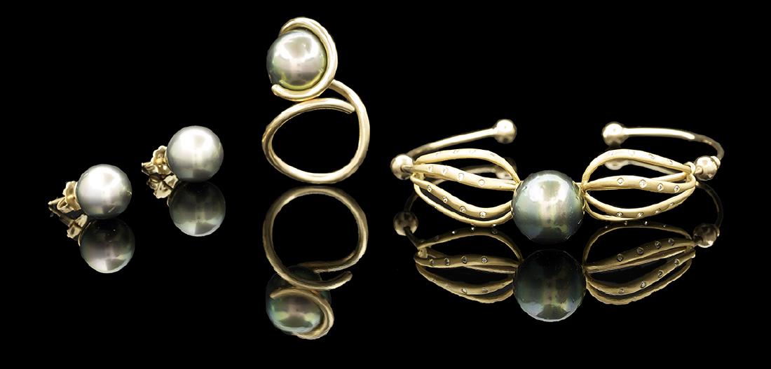 Tahitian Pearl and Diamond Jewelry Suite: Tahitian Pearl and Diamond Jewelry Suite 14k yellow gold, including a bracelet set with a 13.5 mm Tahitian pearl with a very good luster and round brilliant-cut diamonds weighing approximately 0.15 ca