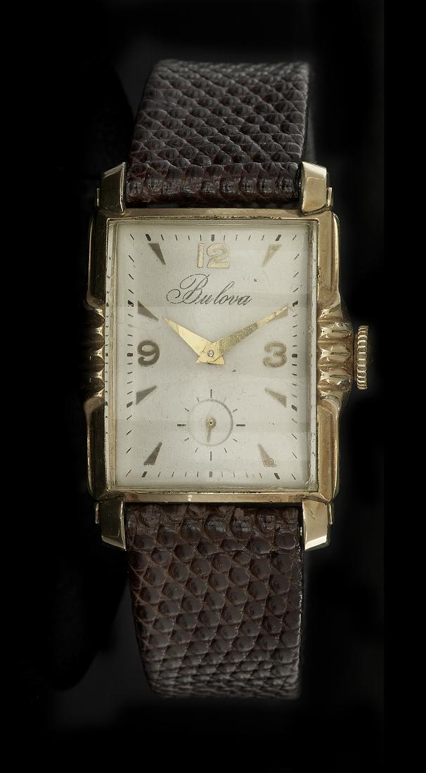 Gentleman's Bulova Wrist Watch: Gentleman's Bulova Wrist Watch gold filled, the rectangular case with a steel back and a round twenty-one jewels manual-wind mechanical movement, the case, dial and movement signed by Bulova, 35.0mm x