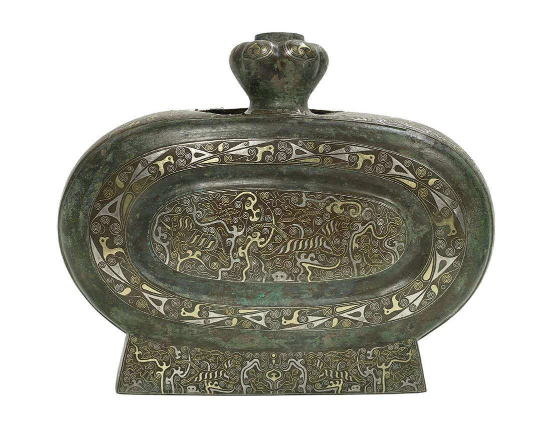 Chinese Bronze Ritual Wine Flask (Bianhu): Chinese Bronze Ritual Wine Flask (Bianhu) Warring States period (475-221 BC), the cast body of flattened oval form, with garlic-head neck, raised on a tapering pedestal base, decorated to the exterior