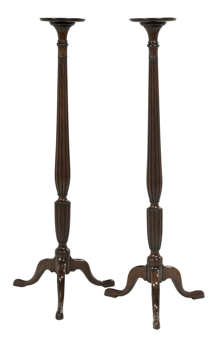 Pair of George III Mahogany Pedestals: Pair of George III Mahogany Pedestals fourth quarter 18th century, each with a dished circular top raised on a bulbous ribbed standard to three splayed cabriole legs ending in pad feet. h. 64-1/4" Pro