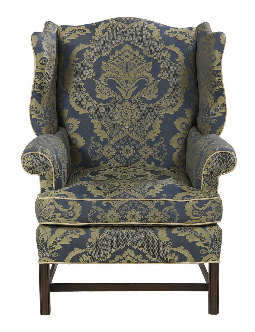 George III-Style Mahogany Wing Chair: George III-Style Mahogany Wing Chair the arched top rail flanked by shaped wings joined to closed arms, with a loose seat cushion and raised on molded Marlborough legs joined by an H-form stretcher, u