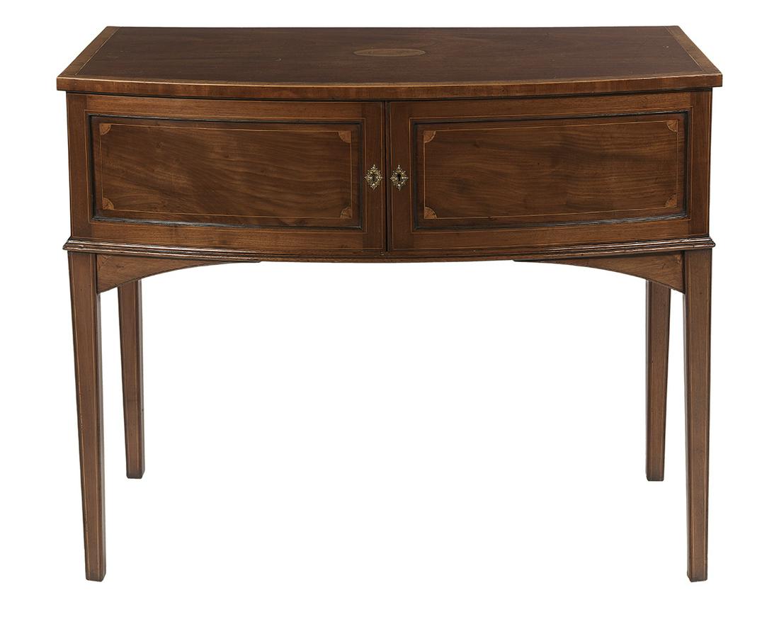 George III-Style Mahogany Bowfront Server: George III-Style Mahogany Bowfront Server 19th century, the banded and bowed top above a conforming frieze fitted with two paneled cupboard doors, raised on tapering square legs with inlaid decorative