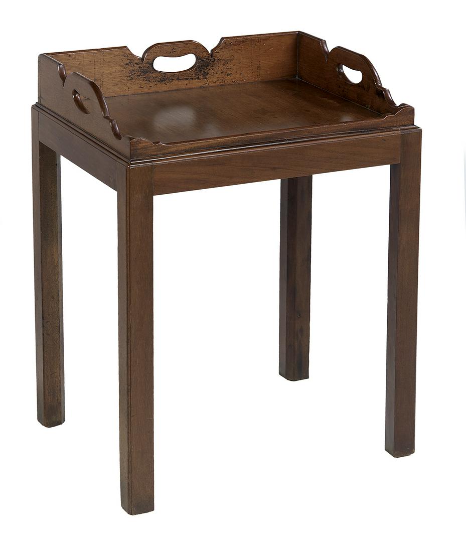 George III Mahogany Tray: George III Mahogany Tray fourth quarter 18th century, the rectangular tray with a three-quarter shaped and pierced gallery, now raised on a later stand of chamfered square legs. h. 26", w. 20-3/4", d.
