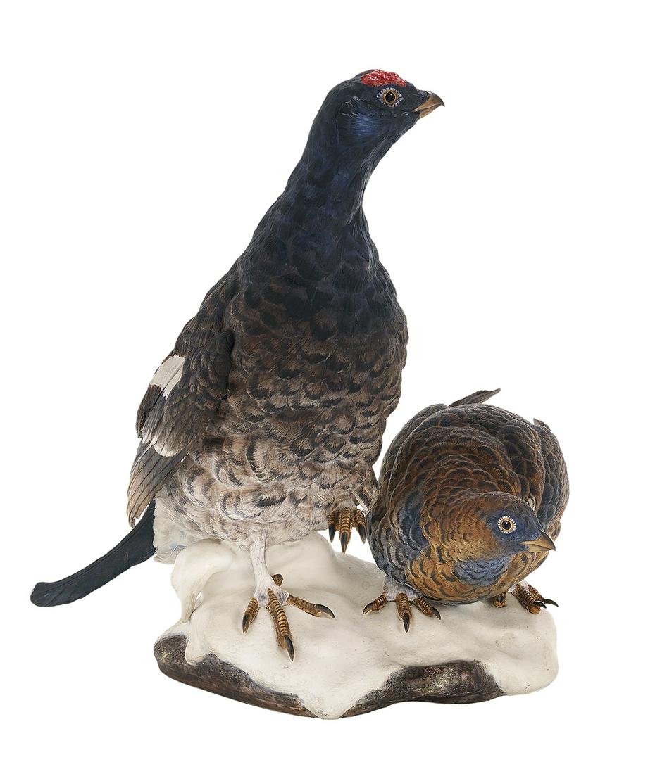 Boehm Porcelain Sculpture of Two Black Grouse: Boehm Porcelain Sculpture of Two Black Grouse English, 1970-1979, depicting two birds on a mound, marked with a horsehead, a crown, and a "Boehm Porcelain, made in England" on the bottom. h. 15", w. 1
