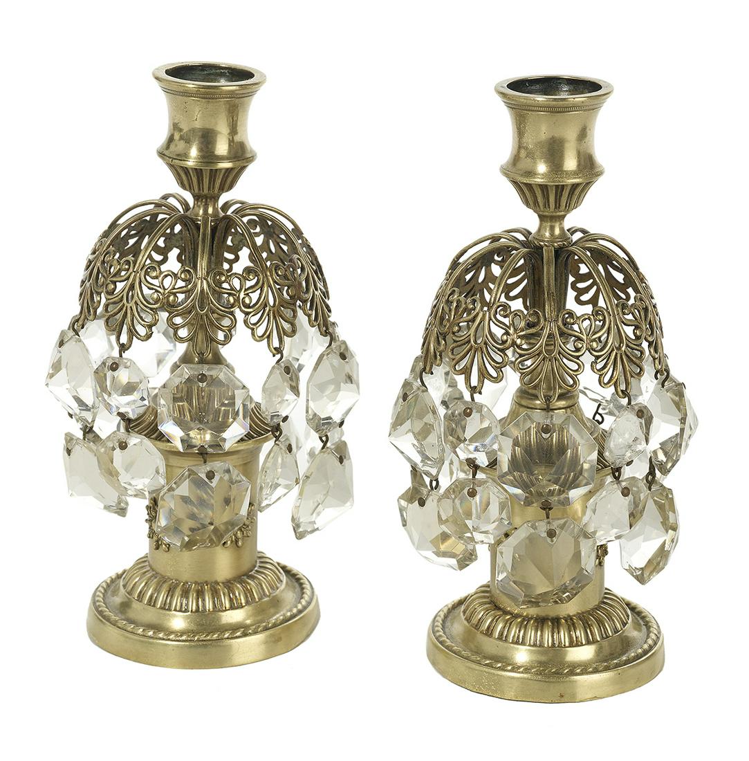 Pair of Regency Brass Candlesticks: Pair of Regency Brass Candlesticks first quarter 19th century, polished and lacquered, with prisms of later origin. h. 7-1/2", dia. 3". Provenance: Bruce McCashin Collection.