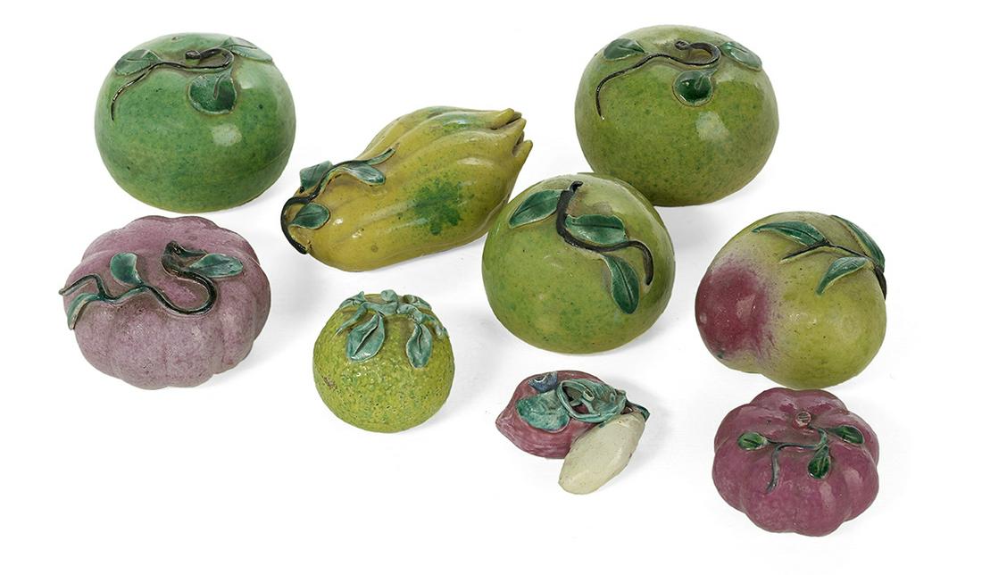 9 Pieces of Chinese Pottery Fruits and Vegetables: Nine Pieces of Chinese Pottery Fruits and Vegetables first quarter 20th century, with polychrome glazes. h. 1-1/2" to 2-1/4", w. 2" to 4-1/4", d. 2" to 3" Provenance: Bruce McCashin Collection.