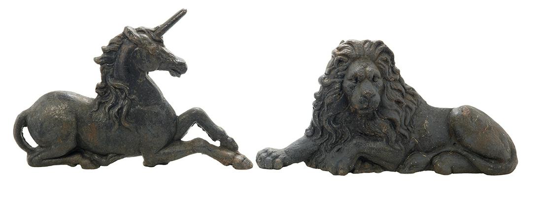 Victorian Cast Iron Lion & Unicorn Andirons: Large Victorian Cast Iron Recumbent Lion and Unicorn Andirons mid-19th century, representing the arms of England, with molded billet bars. h. 16", w. 20", d. 11-1/2" Provenance: Bruce McCashin Collect