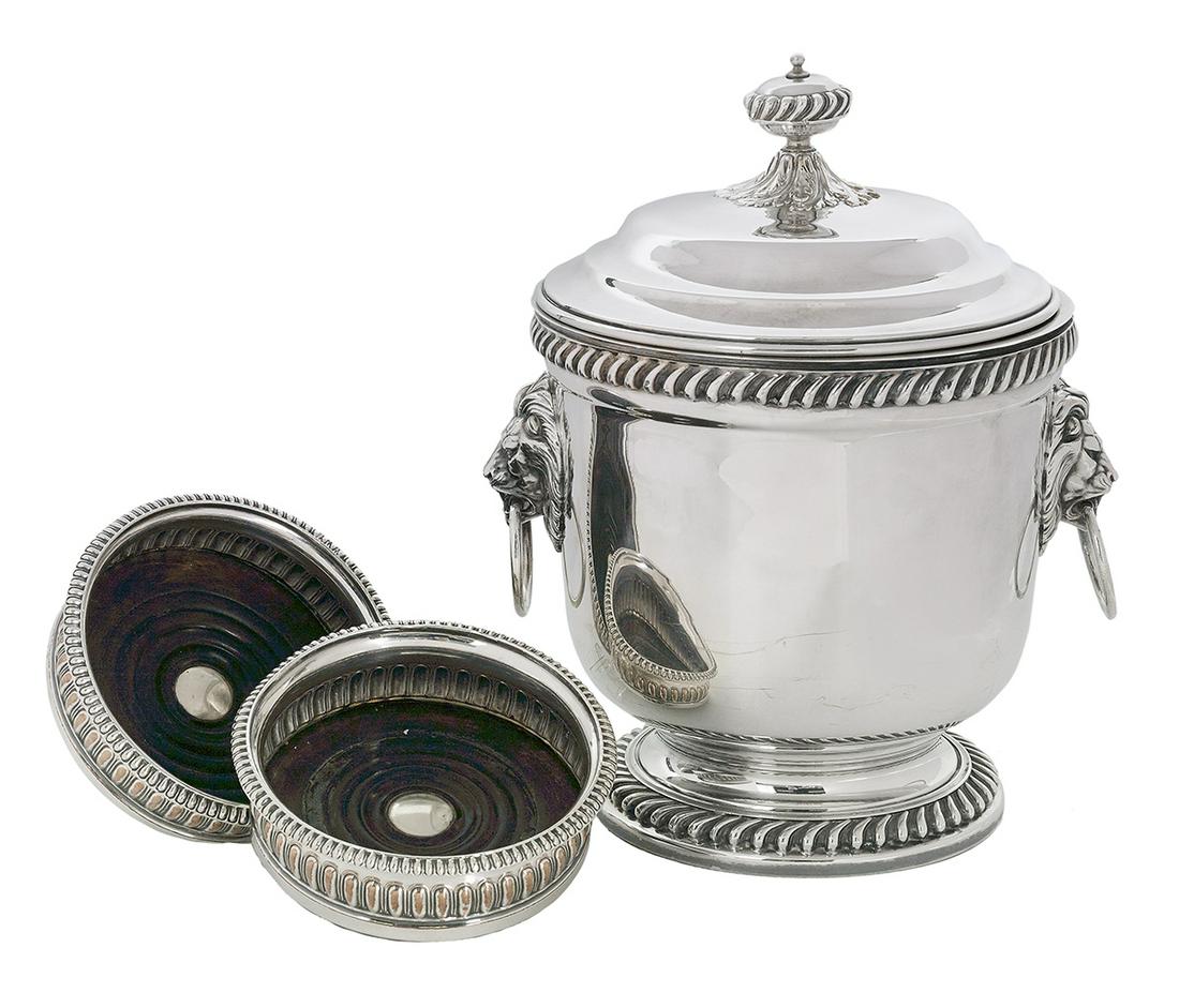 Pair of Wine Coasters & Ice Bucket: Pair of Old Sheffield Plate Wine Coasters and a Later Silverplate Ice Bucket the George IV wine coasters, 19th century, with gadrooned sides and rims around a turned wood base, dia. 5-3/4"; the silver