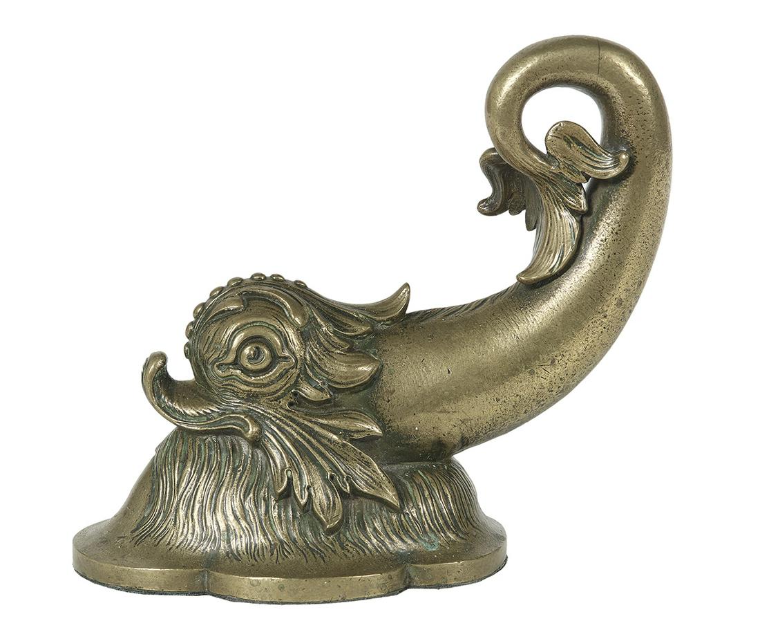 Continental Cast Bronze Paperweight: Continental Cast Bronze Paperweight first half 19th century, modeled as a neoclassical dolphin on a lobed base, with seamed construction. h. 7", w. 7-1/4", d. 3-3/4" Provenance: Bruce McCashin Collect