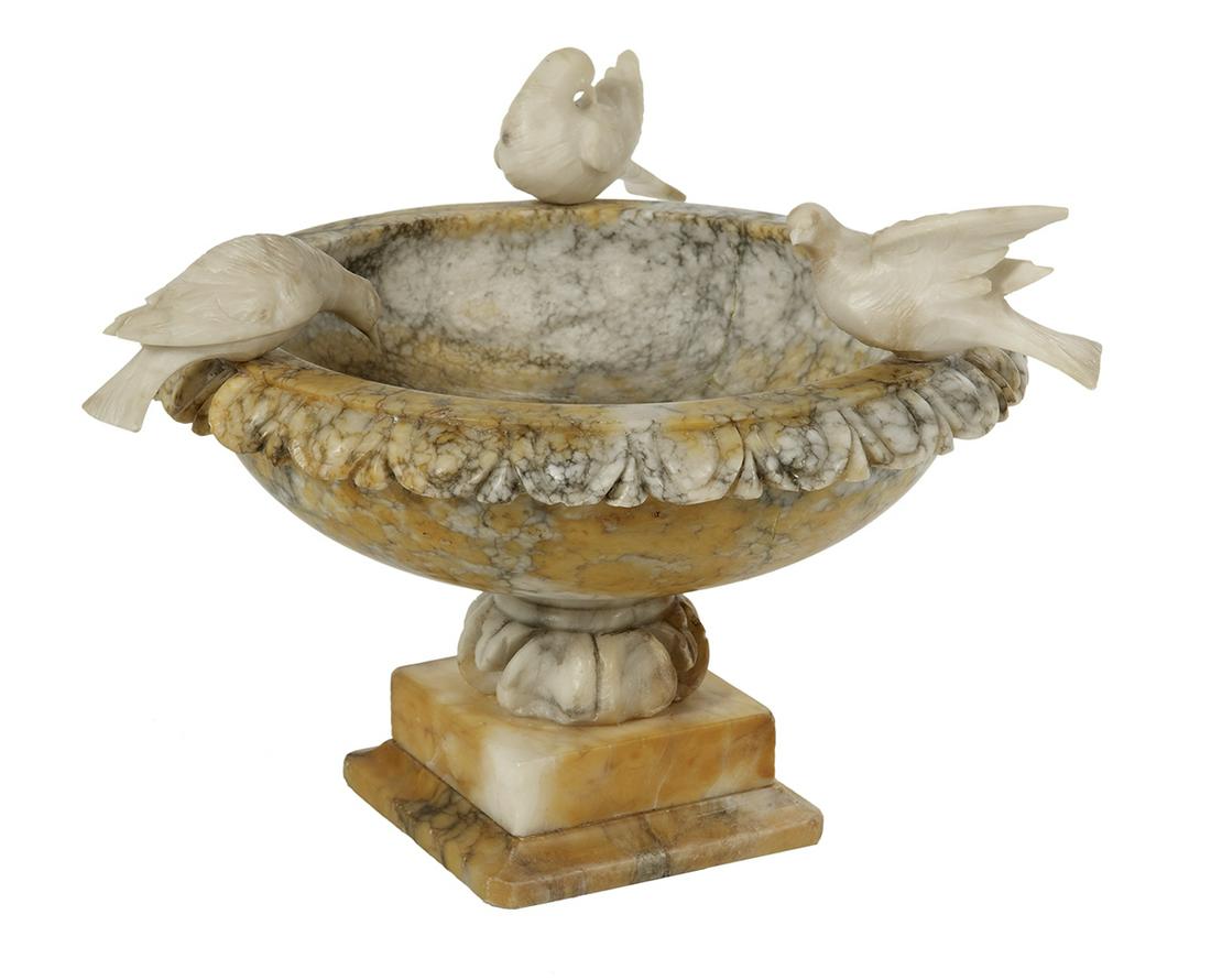 Italian Carved Alabaster Urn: Italian Carved Alabaster Urn ca. 1900, the mottled gray and yellow alabaster fountain-form urn with an egg-and-dart molding, mounted with carved doves. h. 10-1/4", dia. 12-1/2" Provenance: Bruce McCas