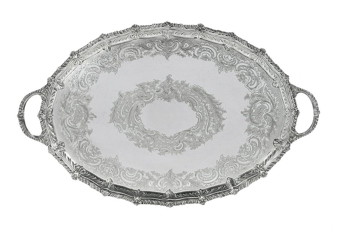 Edwardian Silverplate Tea Tray: Edwardian Silverplate Tea Tray first quarter 20th century, by Albert Henry Thompson, Sheffield, oval with flat-chased rococo-banded plateau and applied gadroon-and-acanthus rim and handles. 28" x 17-1