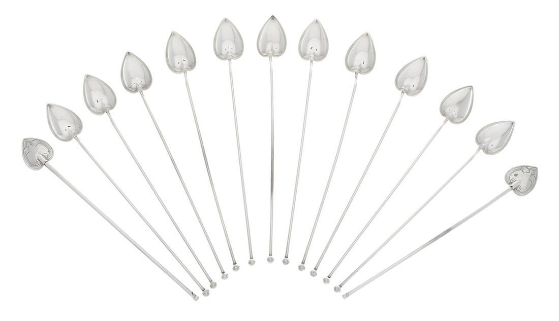 Thirteen Sterling Silver Iced Tea Sippers: Thirteen Sterling Silver Iced Tea Sippers 20th century, including eleven by Watson Co., Attleboro, Massachusetts, and an unmarked pair, all with heart-shaped bowls, the Watson pieces with ball finial,