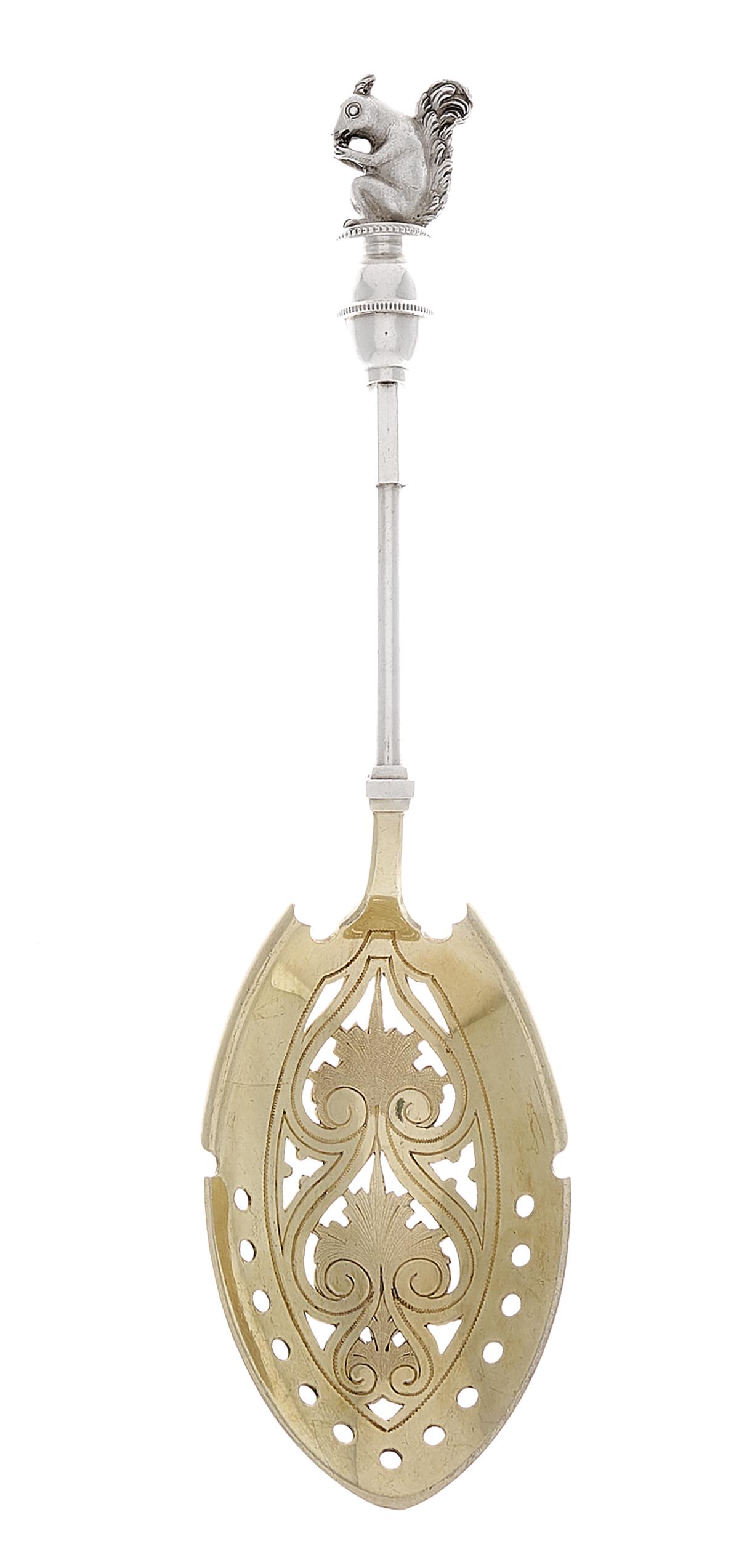 Wood & Hughes Sterling Silver Nut Serving Spoon: Wood & Hughes Sterling Silver Nut Serving Spoon third quarter 19th century, New York, New York, the cylindrical stem surmounted by a figural finial of a squirrel seated on a beaded vasiform finial, th