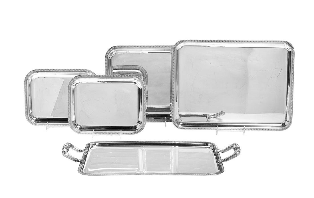 Five Christofle "Malmaison" Silverplate Trays: Five Christofle "Malmaison" Silverplate Trays contemporary, including: two small trays, 10-3/8" x 8"; one medium tray, 13-7/8" x 11"; one large tray, 16-3/8" x 12-1/2"; and one large handled tray, 21"