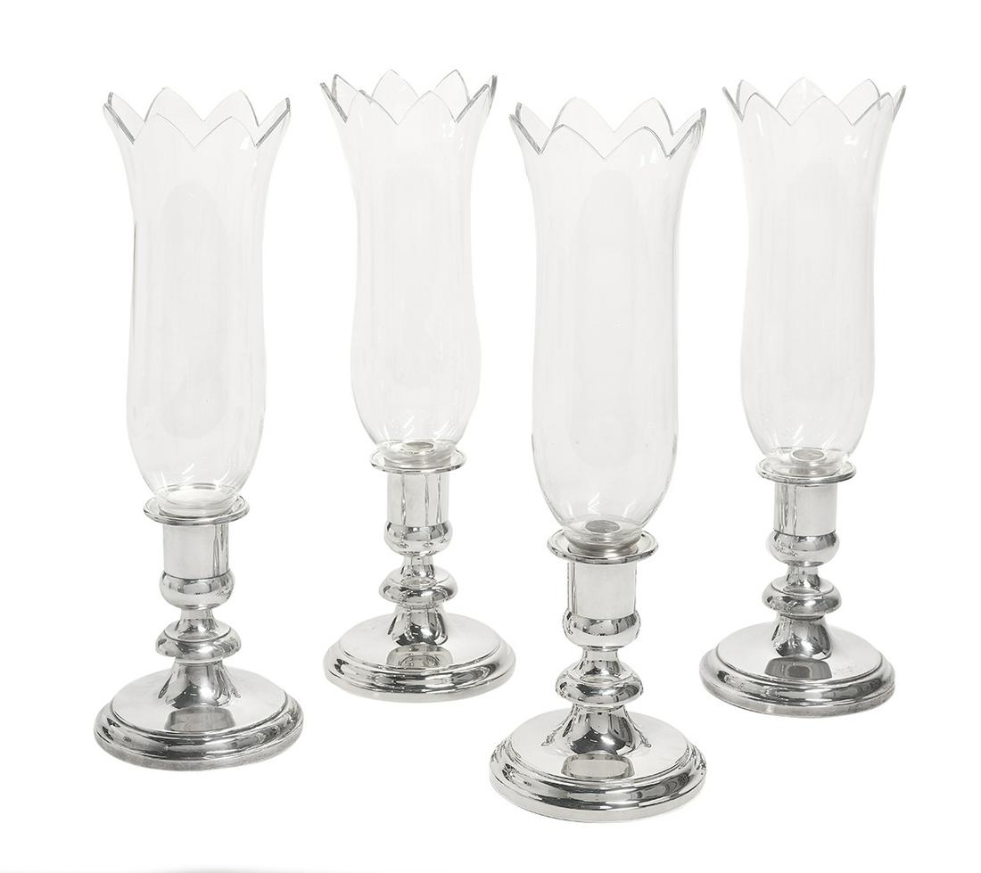 Four Christofle Silverplate Hurricane Lamps: Set of Four Christofle Silverplate and Glass Hurricane Lamps contemporary, Paris, the silverplate bases with a knopped standard above an ogee-domed base, the vasiform socket fitted with a candle nozzl