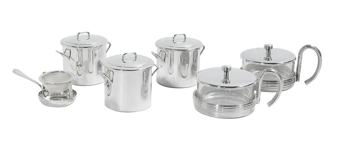 Six Pieces of French Silverplate Tableware: Six Pieces of French Silverplate Tableware contemporary, including: an Ercuis tilting tea strainer with shell pattern handle, l. 5-1/2"; a pair of Christofle Fleuron jam jars with glass body, reeded b